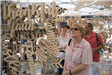 People Browsing Wood Carvings