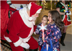 Santa Posing with Children