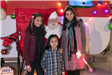 Santa Posing with Children