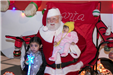 Santa Posing with Children