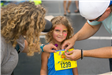 Child Getting Race Number Pinned