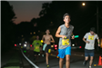 Runners in the Race at Night