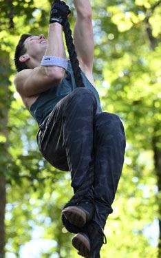 John Aguilar climbing the rope