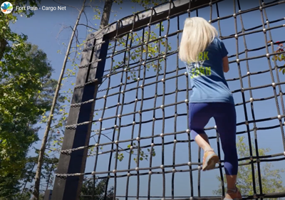 Man climbing an Olympus Wall